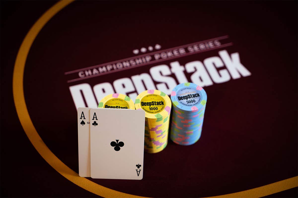 Two ace cards resting on a stack of poker chips